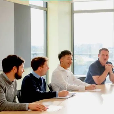 Group of men in a meeting